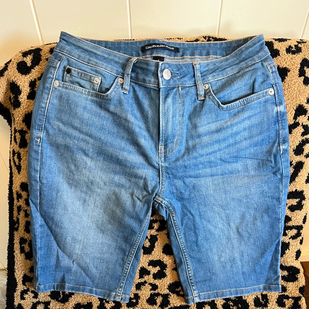 3 Pairs of CALVIN KLEIN SIZE 6 SHORTS (2 in light wash and 1 in medium wash)